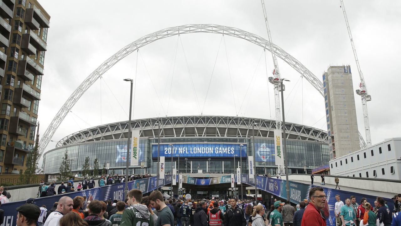 LONDON, ENGLAND - OCTOBER 01: Fans arrive at the stadium prior to kickoff the NFL game between the Miami Dolphins and the New Orleans Saints at Wembley Stadium on October 1, 2017 in London, England.
