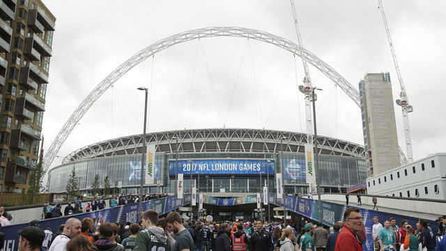 LONDON, ENGLAND - OCTOBER 01: Fans arrive at the stadium prior to kickoff the NFL game between the Miami Dolphins and the New Orleans Saints at Wembley Stadium on October 1, 2017 in London, England.