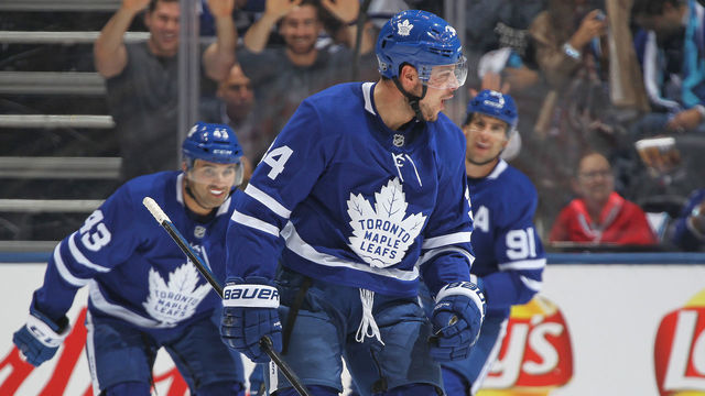 TORONTO, ON - OCTOBER 3: Auston Matthews #34 of the Toronto Maple Leafs celebrates his 1st goal of the season against the Montreal Canadiens during an NHL game at Scotiabank Arena on October 3, 2018 in Toronto, Ontario, Canada. The Maple Leafs defeated the Canadiens 3-2 in overtime.
