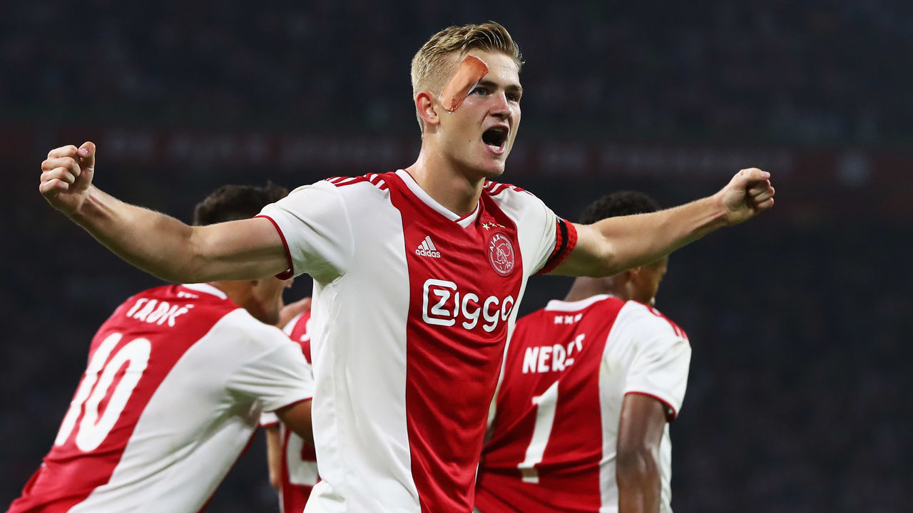 AMSTERDAM, NETHERLANDS - AUGUST 14: Matthijs de Ligt of Ajax celebrates scoring his teams second goal of the game during the UEFA Champions League third round qualifying match between Ajax and Royal Standard de Liege at Johan Cruyff Arena on August 14, 2018 in Amsterdam, Netherlands.