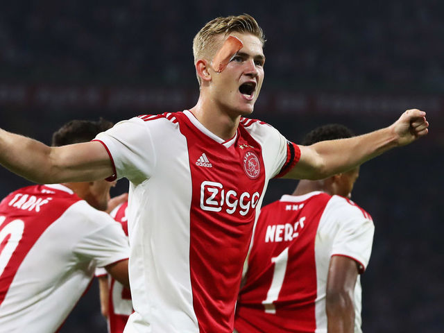 AMSTERDAM, NETHERLANDS - AUGUST 14: Matthijs de Ligt of Ajax celebrates scoring his teams second goal of the game during the UEFA Champions League third round qualifying match between Ajax and Royal Standard de Liege at Johan Cruyff Arena on August 14, 2018 in Amsterdam, Netherlands.
