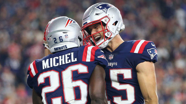 FOXBOROUGH, MA - OCTOBER 04: Sony Michel #26 of the New England Patriots celebrates with Chris Hogan #15 after rushing for a 34-yard touchdown during the fourth quarter against the Indianapolis Colts at Gillette Stadium on October 4, 2018 in Foxborough, Massachusetts.