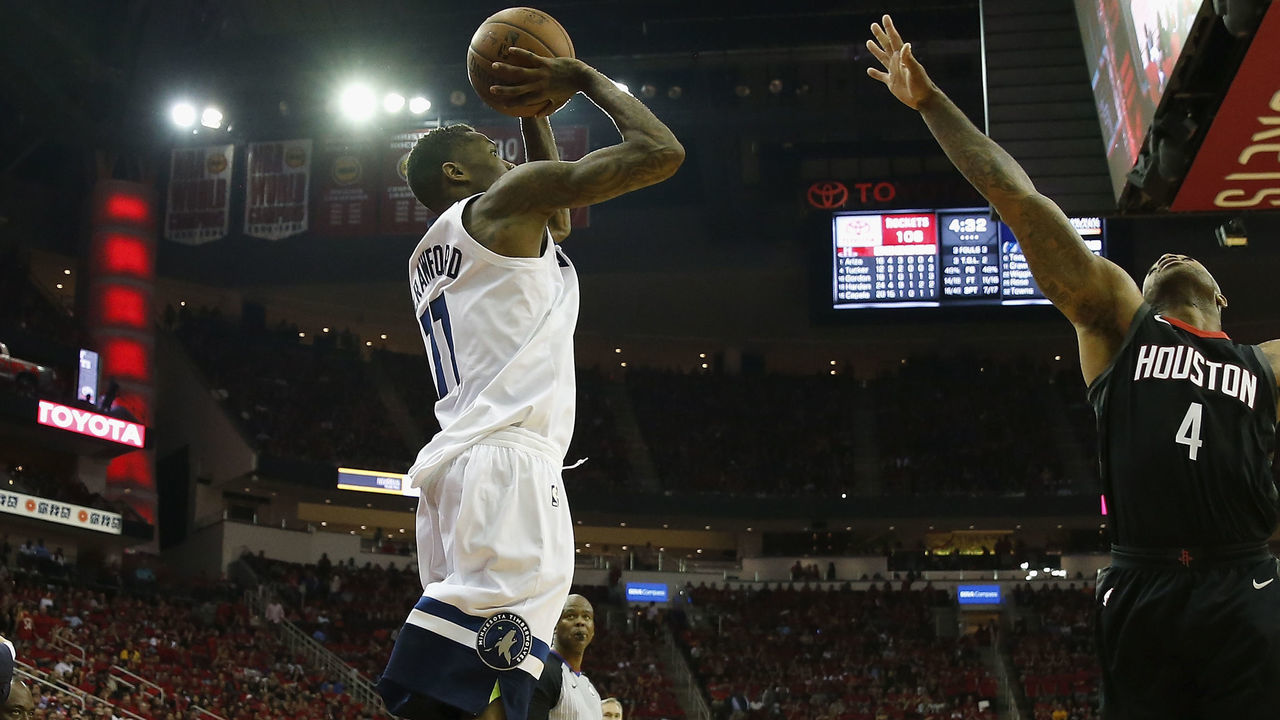 HOUSTON, TX - APRIL 25: Jamal Crawford #11 of the Minnesota Timberwolves takes a three point shot defended by PJ Tucker #4 of the Houston Rockets in the second half during Game Five of the first round of the 2018 NBA Playoffs at Toyota Center on April 25, 2018 in Houston, Texas.