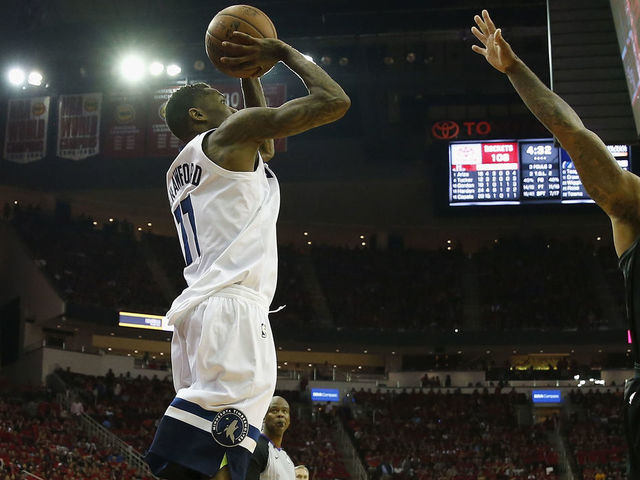 HOUSTON, TX - APRIL 25: Jamal Crawford #11 of the Minnesota Timberwolves takes a three point shot defended by PJ Tucker #4 of the Houston Rockets in the second half during Game Five of the first round of the 2018 NBA Playoffs at Toyota Center on April 25, 2018 in Houston, Texas.