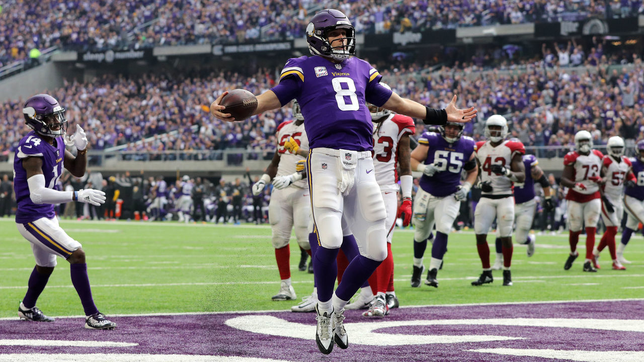 MINNEAPOLIS, MN - OCTOBER 14: Kirk Cousins #8 of the Minnesota Vikings runs into the end zone with the ball for a touchdown in the third quarter of the game against the Arizona Cardinals at U.S. Bank Stadium on October 14, 2018 in Minneapolis, Minnesota.