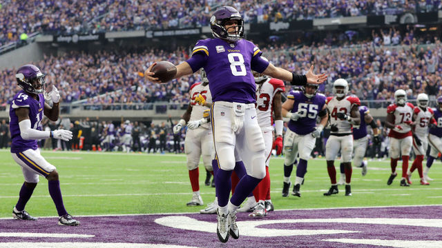 MINNEAPOLIS, MN - OCTOBER 14: Kirk Cousins #8 of the Minnesota Vikings runs into the end zone with the ball for a touchdown in the third quarter of the game against the Arizona Cardinals at U.S. Bank Stadium on October 14, 2018 in Minneapolis, Minnesota.
