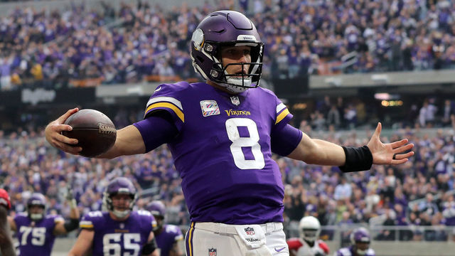 MINNEAPOLIS, MN - OCTOBER 14: Kirk Cousins #8 of the Minnesota Vikings runs into the end zone with the ball for a touchdown in the third quarter of the game against the Arizona Cardinals at U.S. Bank Stadium on October 14, 2018 in Minneapolis, Minnesota.