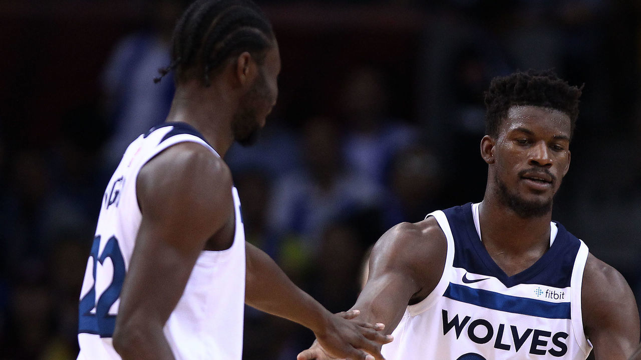 SHENZHEN, CHINA - OCTOBER 05: Jimmy Butler #23, Andrew Wiggins #22 and Jeff Teague #0 of the Minnesota Timberwolves celebrate during the game between the Minnesota Timberwolves and the Golden State Warriors as part of 2017 NBA Global Games China at Universidade Center on October 5, 2017 in Shenzhen, China.