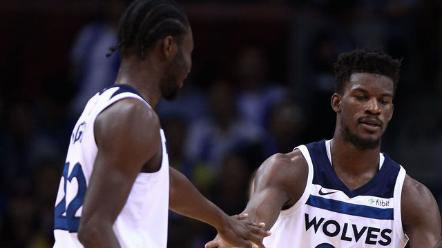 SHENZHEN, CHINA - OCTOBER 05: Jimmy Butler #23, Andrew Wiggins #22 and Jeff Teague #0 of the Minnesota Timberwolves celebrate during the game between the Minnesota Timberwolves and the Golden State Warriors as part of 2017 NBA Global Games China at Universidade Center on October 5, 2017 in Shenzhen, China.