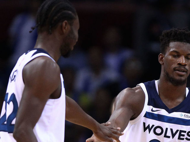 SHENZHEN, CHINA - OCTOBER 05: Jimmy Butler #23, Andrew Wiggins #22 and Jeff Teague #0 of the Minnesota Timberwolves celebrate during the game between the Minnesota Timberwolves and the Golden State Warriors as part of 2017 NBA Global Games China at Universidade Center on October 5, 2017 in Shenzhen, China.