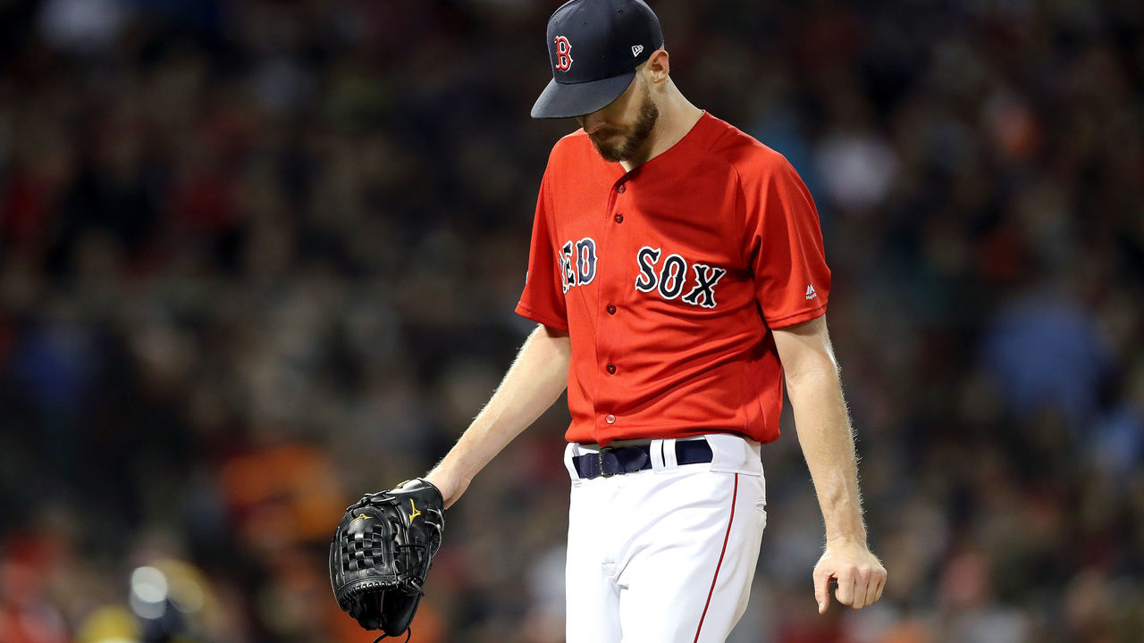 BOSTON, MA - OCTOBER 13: Chris Sale #41 of the Boston Red Sox reacts after allowing two runs during the second inning against the Houston Astros in Game One of the American League Championship Series at Fenway Park on October 13, 2018 in Boston, Massachusetts.