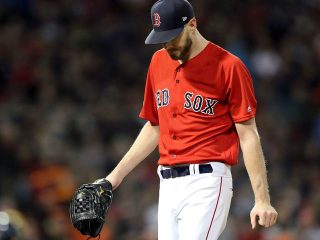 BOSTON, MA - OCTOBER 13: Chris Sale #41 of the Boston Red Sox reacts after allowing two runs during the second inning against the Houston Astros in Game One of the American League Championship Series at Fenway Park on October 13, 2018 in Boston, Massachusetts.