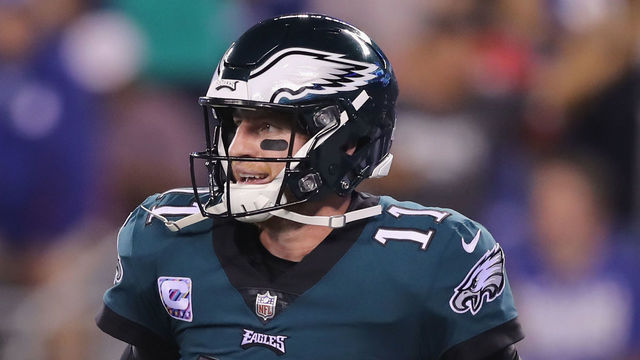 EAST RUTHERFORD, NJ - OCTOBER 11: Carson Wentz #11 of the Philadelphia Eagles celebrates his touchdown pass to teammate Zach Ertz in the second quarter against the New York Giants on October 11,2018 at MetLife Stadium in East Rutherford, New Jersey.