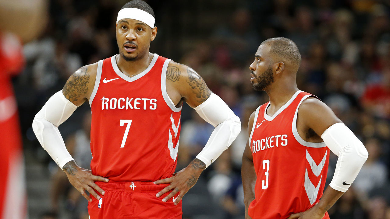 SAN ANTONIO, TX - OCTOBER 7: Carmelo Anthony #7 of the Houston Rockets talks with teammate Chris Paul #3 during a preseason against the San Antonio Spurs game on October 7, 2018 at the AT&T Center in San Antonio, Texas.