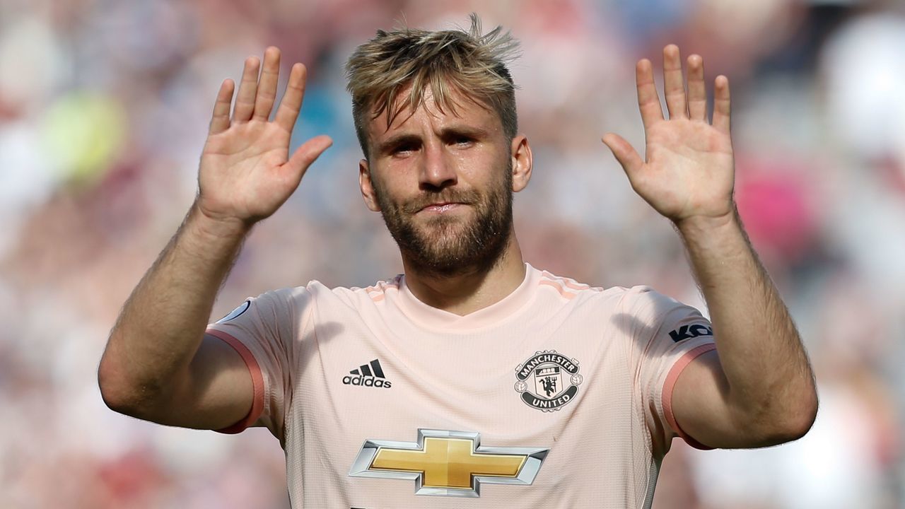 Manchester United's English defender Luke Shaw applauds at the end of the English Premier League football match between West Ham United and Manchester United at The London Stadium, in east London on September 29, 2018.