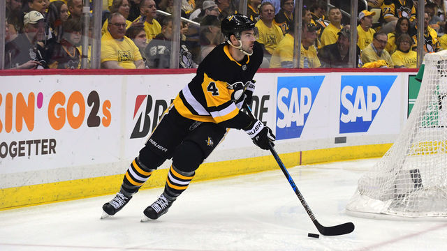PITTSBURGH, PA - APRIL 13: Justin Schultz #4 of the Pittsburgh Penguins skates with te puck against the Philadelphia Flyers in Game Two of the Eastern Conference First Round during the 2018 NHL Stanley Cup Playoffs at PPG PAINTS Arena on April 13, 2018 in Pittsburgh, Pennsylvania.