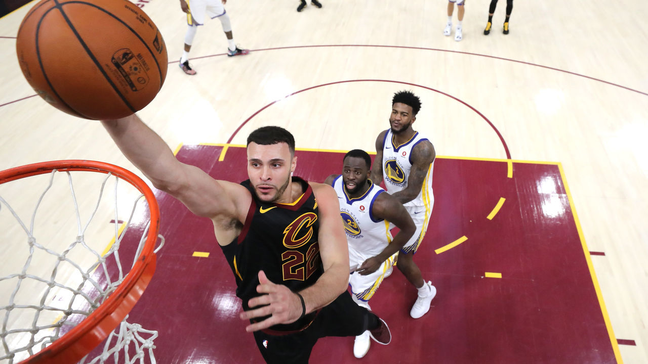 CLEVELAND, OH - JUNE 08: Larry Nance Jr. #22 of the Cleveland Cavaliers drives to the basket in the first half against Draymond Green #23 of the Golden State Warriors during Game Four of the 2018 NBA Finals at Quicken Loans Arena on June 8, 2018 in Cleveland, Ohio.