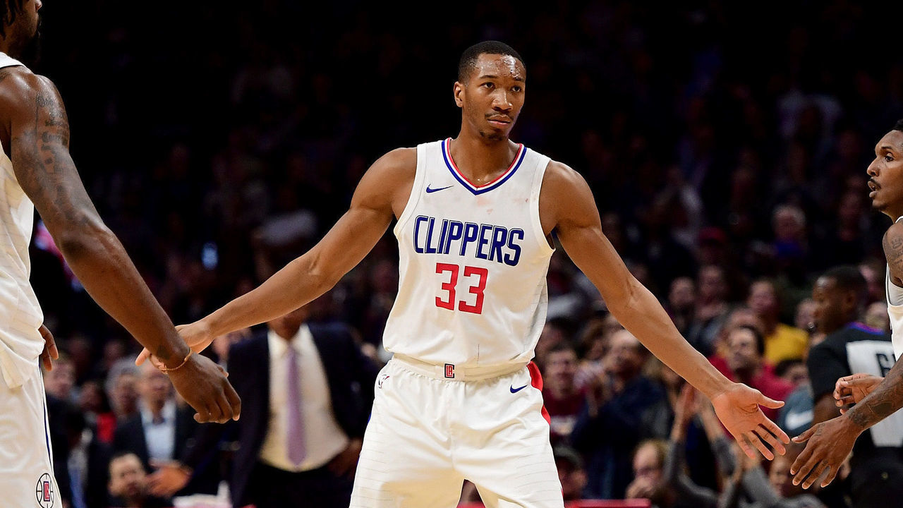 LOS ANGELES, CA - NOVEMBER 27: Wesley Johnson #33 of the LA Clippers celebrates a Lou Williams #23 three pointer with DeAndre Jordan #6 during the second quarter in a 120-115 win over the Los Angeles Lakers at Staples Center on November 27, 2017 in Los Angeles, California.