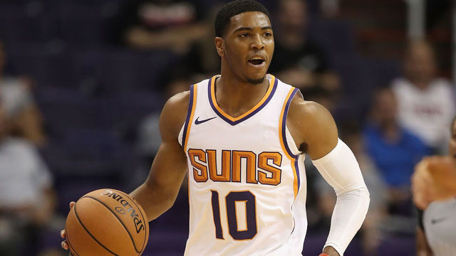 PHOENIX, AZ - OCTOBER 03: Shaquille Harrison #10 of the Phoenix Suns handles the ball during the first half of the NBA game against the New Zealand Breakers at Talking Stick Resort Arena on October 3, 2018 in Phoenix, Arizona.