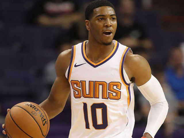 PHOENIX, AZ - OCTOBER 03: Shaquille Harrison #10 of the Phoenix Suns handles the ball during the first half of the NBA game against the New Zealand Breakers at Talking Stick Resort Arena on October 3, 2018 in Phoenix, Arizona.