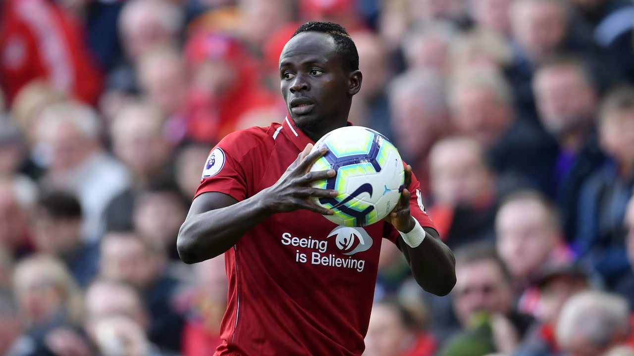 LIVERPOOL, ENGLAND - OCTOBER 07: Sadio Mane of Liverpool prepares to take a throw-in during the Premier League match between Liverpool FC and Manchester City at Anfield on October 07, 2018 in Liverpool, United Kingdom.