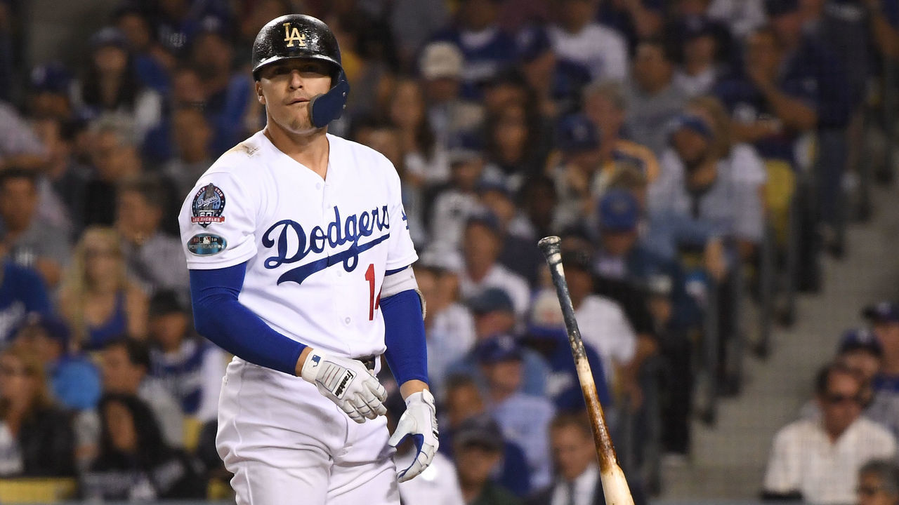 LOS ANGELES, CA - OCTOBER 15: Enrique Hernandez #14 of the Los Angeles Dodgers reacts after striking out during the eighth inning against the Milwaukee Brewers in Game Three of the National League Championship Series at Dodger Stadium on October 15, 2018 in Los Angeles, California.