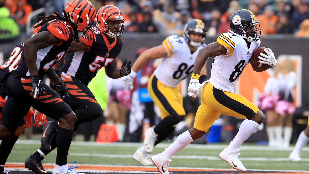 CINCINNATI, OH - OCTOBER 14: Antonio Brown #84 of the Pittsburgh Steelers runs the ball away from Vontaze Burfict #55 of the Cincinnati Bengals and Dre Kirkpatrick #27 during the fourth quarter at Paul Brown Stadium on October 14, 2018 in Cincinnati, Ohio. Pittsburgh defeated Cincinnati 28-21.