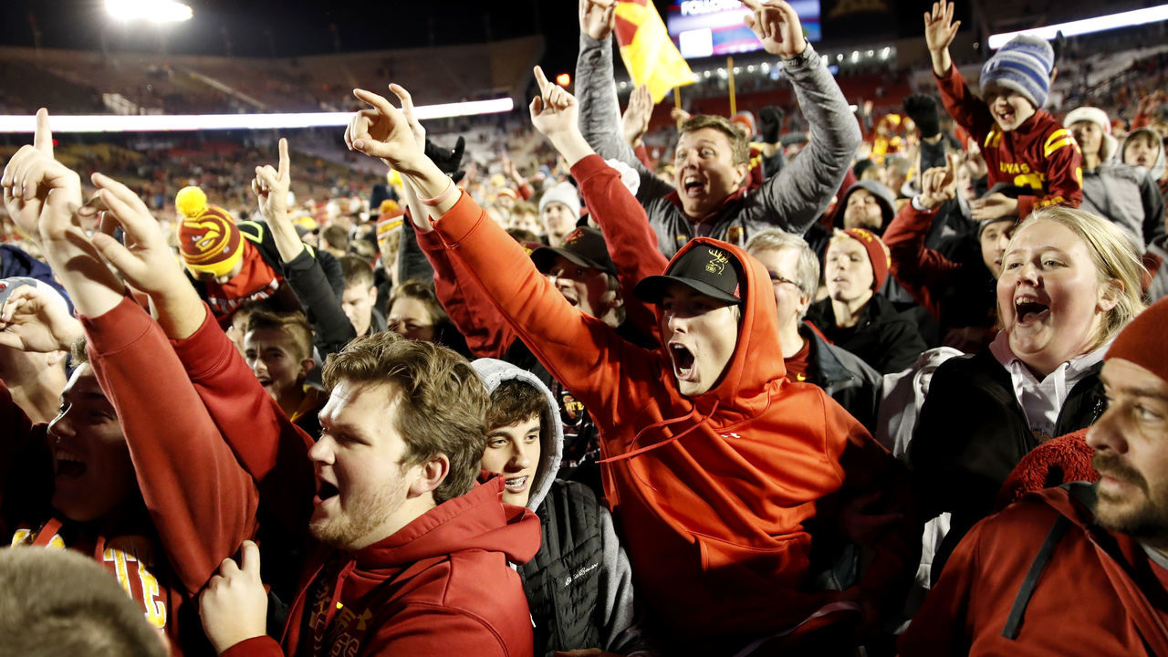 AMES, IA - OCTOBER 13: The Iowa State Cyclones fans celebrates by storming the field after the Cyclones defeated the West Virginia Mountaineers 30-14 at Jack Trice Stadium on October 13, 2018 in Ames, Iowa. The Iowa State Cyclones won 30-14 over the West Virginia Mountaineers.
