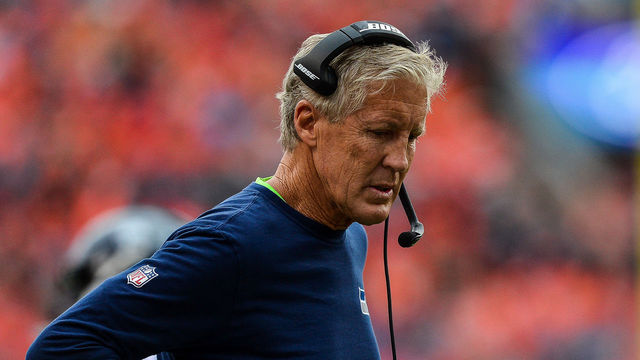 DENVER, CO - SEPTEMBER 9: Head coach Pete Carroll of the Seattle Seahawks looks to the ground during a game against the Denver Broncos at Broncos Stadium at Mile High on September 9, 2018 in Denver, Colorado.