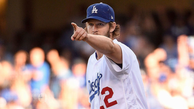 LOS ANGELES, CA - OCTOBER 17: Clayton Kershaw #22 of the Los Angeles Dodgers celebrates after a play by Manny Machado #8 (not pictured) to end the seventh inning against the Milwaukee Brewers in Game Five of the National League Championship Series at Dodger Stadium on October 17, 2018 in Los Angeles, California.
