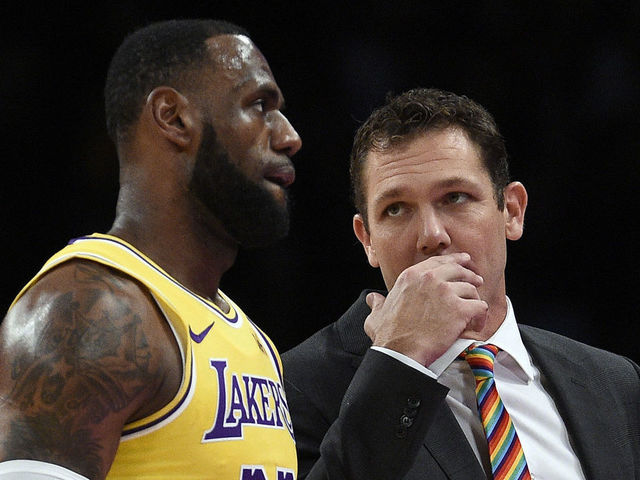 LOS ANGELES, CA - OCTOBER 04: Head coach Luke Walton of the Los Angeles talks with LeBron James #23 during a pre-season basketball game against Sacramento Kingsat Staples Center on October 4, 2018 in Los Angeles, California.