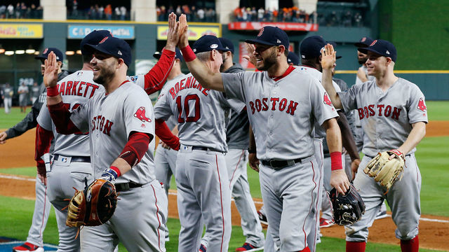 HOUSTON, TX - OCTOBER 17: The Boston Red Sox celebrate defeating the Houston Astros 8-6 in Game Four of the American League Championship Series at Minute Maid Park on October 17, 2018 in Houston, Texas.