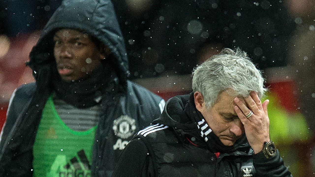 (FILES) in this March 17, 2018 file photo, Manchester United's Portuguese manager Jose Mourinho (R) and French midfielder Paul Pogba leave after the English FA Cup quarter-final football match between Manchester United and Brighton and Hove Albion at Old Trafford in Manchester, north west England. - Paul Pogba has been told by Manchester United manager Jose Mourinho he will never captain the club again while the Portuguese remains in charge, according to reports on September 25, 2018, as tensions between United's star midfielder and manager continue to rise.