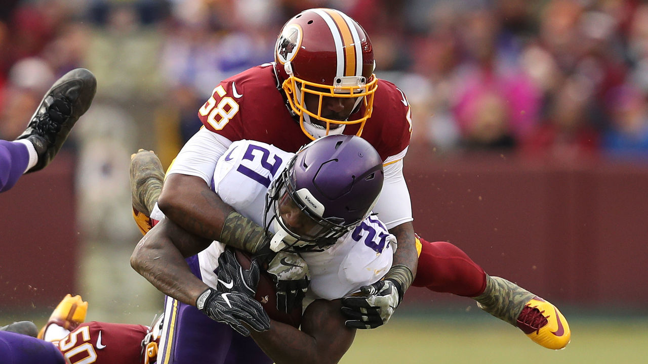 LANDOVER, MD - NOVEMBER 12: Running back Jerick McKinnon #21 of the Minnesota Vikings is tackled by linebacker Junior Galette #58 of the Washington Redskins during the fourth quarter at FedExField on November 12, 2017 in Landover, Maryland.