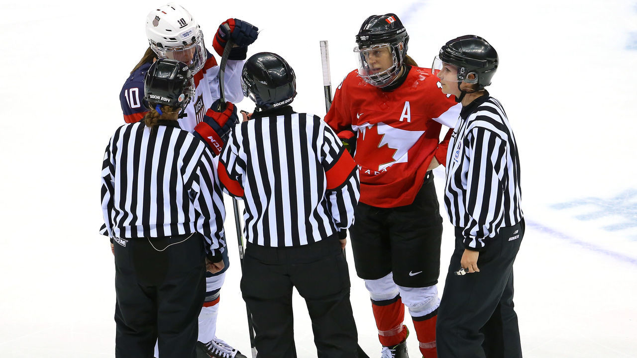 SOCHI, RUSSIA - FEBRUARY 20: Jayna Hefford #16 of Canada talks with referees after a penalty for too many players on the ice during the Ice Hockey Women's Gold Medal Game against the United States on day 13 of the Sochi 2014 Winter Olympics at Bolshoy Ice Dome on February 20, 2014 in Sochi, Russia.