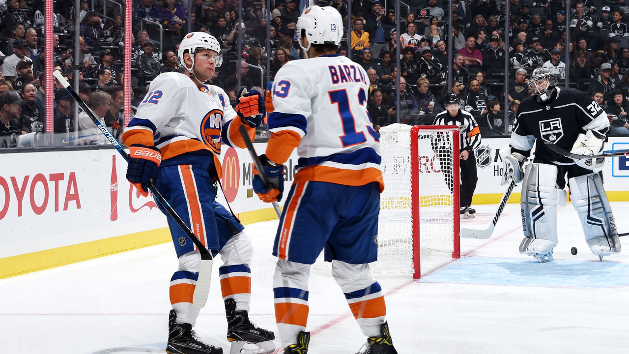 LOS ANGELES, CA - OCTOBER 18: Josh Bailey #12 and Mathew Barzal #13 of the New York Islanders celebrate as goaltender Jonathan Quick #32 of the Los Angeles Kings reacts to Bailey's second-period goal during the game at STAPLES Center on October 18, 2018 in Los Angeles, California.
