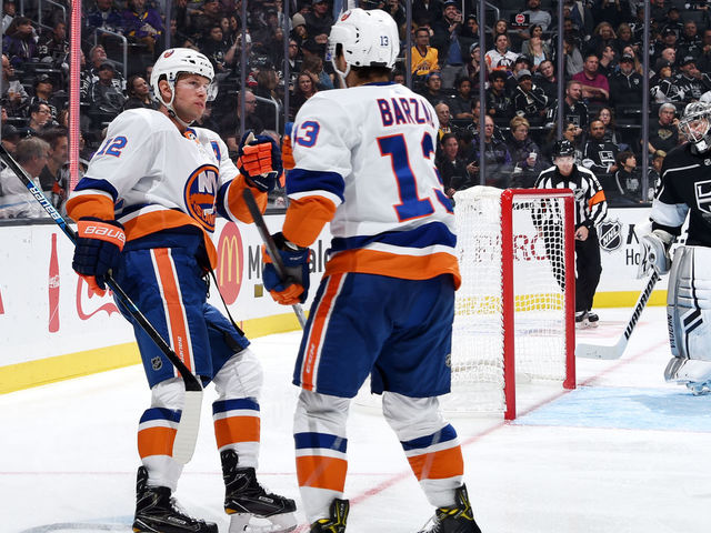 LOS ANGELES, CA - OCTOBER 18: Josh Bailey #12 and Mathew Barzal #13 of the New York Islanders celebrate as goaltender Jonathan Quick #32 of the Los Angeles Kings reacts to Bailey's second-period goal during the game at STAPLES Center on October 18, 2018 in Los Angeles, California.