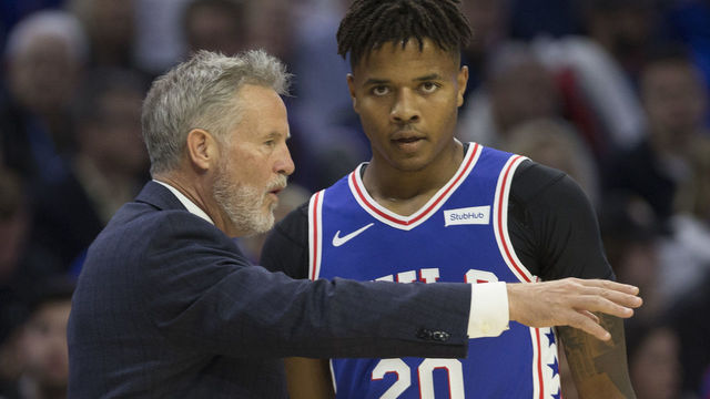 PHILADELPHIA, PA - OCTOBER 18: Head coach Brett Brown of the Philadelphia 76ers talks to Markelle Fultz #20 in the first quarter against the Chicago Bulls at Wells Fargo Center on October 18, 2018 in Philadelphia, Pennsylvania. The 76ers defeated the Bulls 127-108.