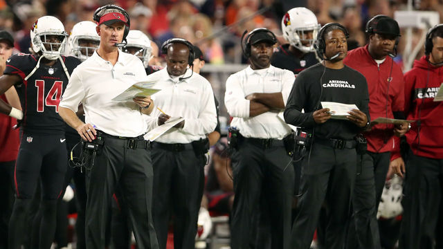 GLENDALE, AZ - OCTOBER 18: Head coach Steve Wilks and offensive coordinator Mike McCoy (left) of the Arizona Cardinals watch the action during the third quarter against the Denver Broncos at State Farm Stadium on October 18, 2018 in Glendale, Arizona.