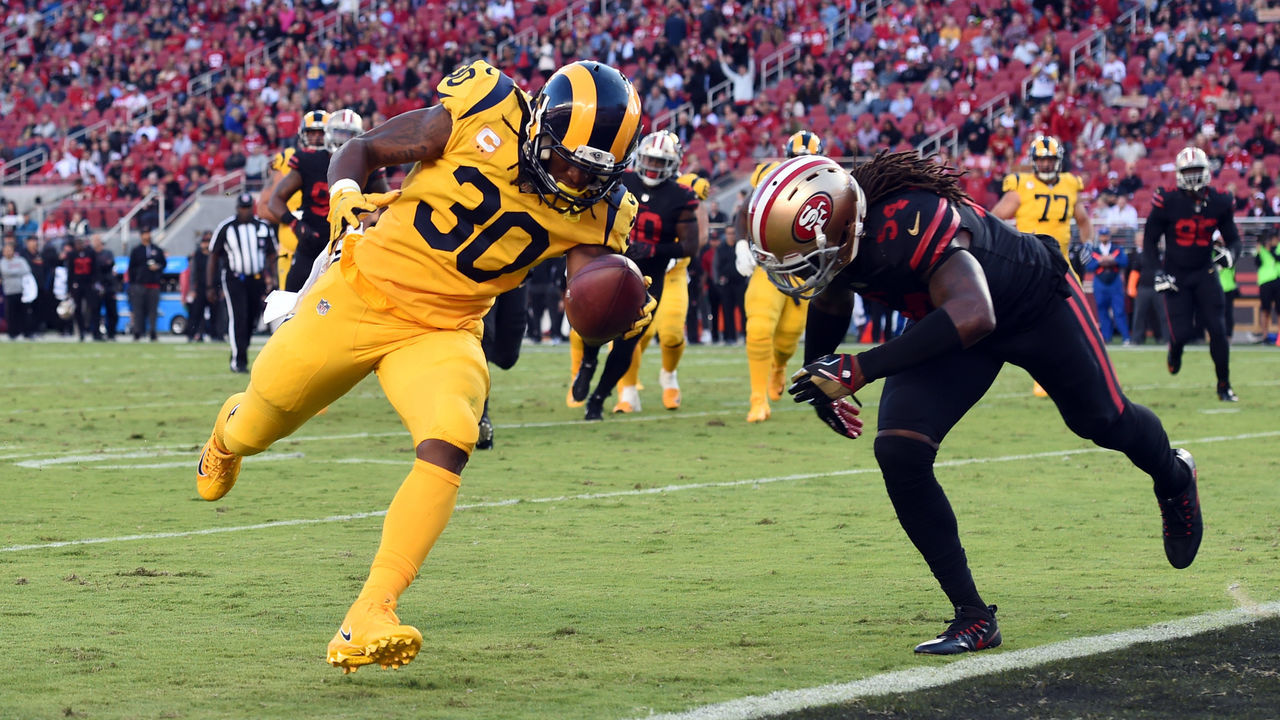 SANTA CLARA, CA - SEPTEMBER 21: Los Angeles Rams Running Back Todd Gurley (30) runs the ball for a touchdown against San Francisco 49ers Linebacker Ray-Ray Armstrong (54) during an NFL game between the Los Angeles Rams and the San Francisco 49ers on September 21, 2017 at Levi's Stadium in Santa Clara, CA.