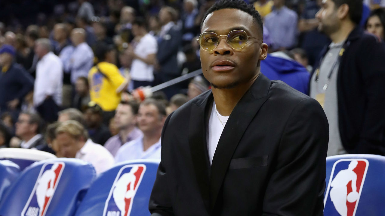 OAKLAND, CA - OCTOBER 16: Injured Russell Westbrook #0 of the Oklahoma City Thunder sits on the bench before their game against the Golden State Warriors at ORACLE Arena on October 16, 2018 in Oakland, California.