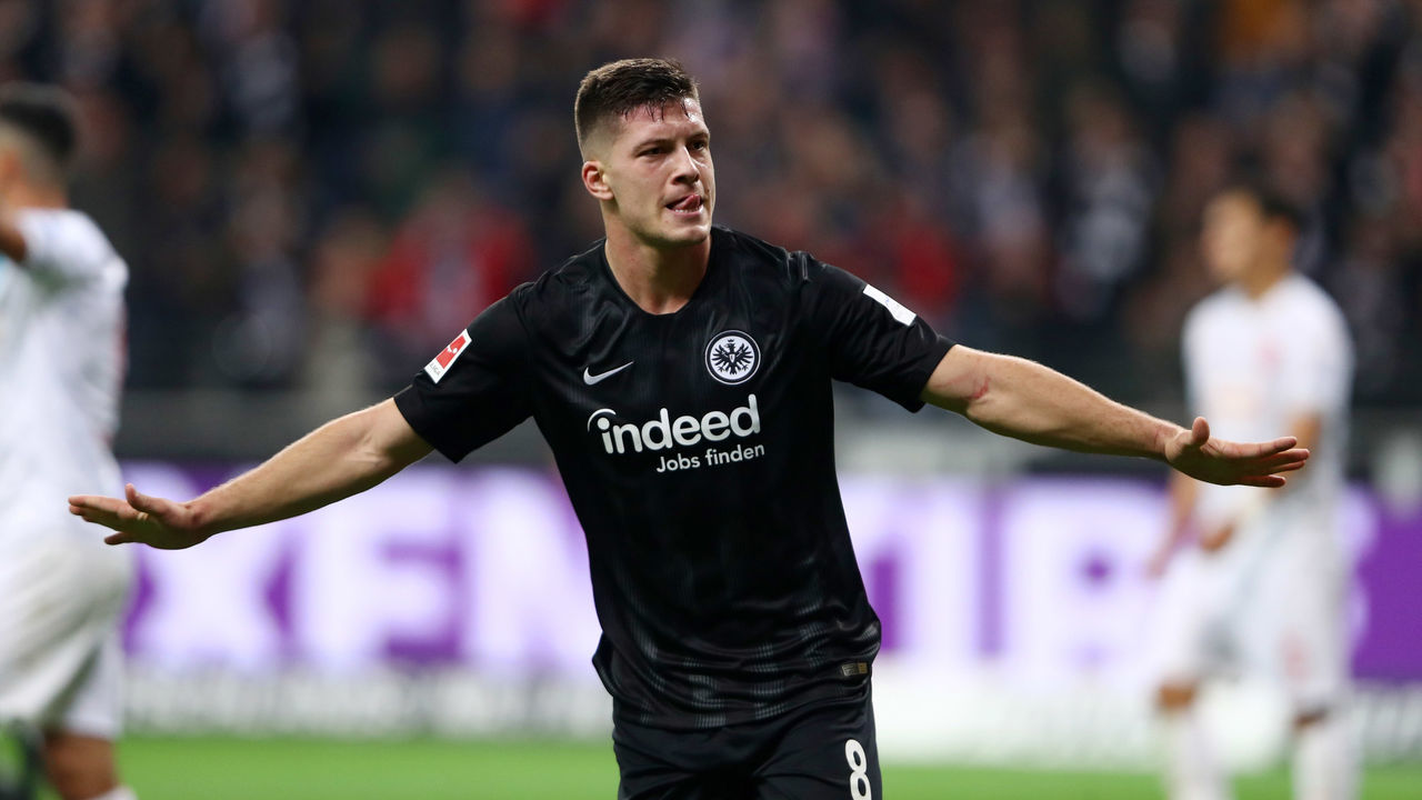 FRANKFURT AM MAIN, GERMANY - OCTOBER 19: Luka Jovic of Eintracht Frankfurt (8) celebrates as he scores his team's seventh goal and his fifth during the Bundesliga match between Eintracht Frankfurt and Fortuna Duesseldorf at Commerzbank-Arena on October 19, 2018 in Frankfurt am Main, Germany.