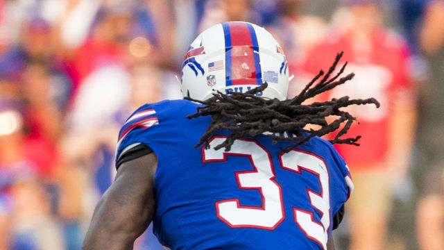 ORCHARD PARK, NY - AUGUST 09: Donte Jackson #26 of the Carolina Panthers tackles Chris Ivory #33 of the Buffalo Bills during the first quarter of a preseason game at New Era Field on August 9, 2018 in Orchard Park, New York.