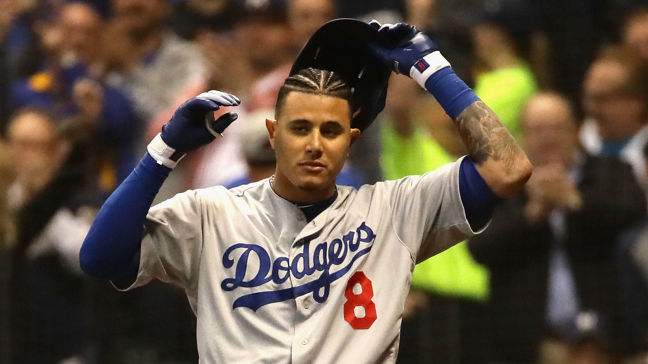 MILWAUKEE, WI - OCTOBER 19: Manny Machado #8 of the Los Angeles Dodgers reacts after striking out against Corey Knebel #46 of the Milwaukee Brewers during the fifth inning in Game Six of the National League Championship Series at Miller Park on October 19, 2018 in Milwaukee, Wisconsin.