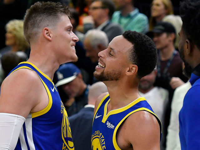 SALT LAKE CITY, UT - OCTOBER 19: Jonas Jerebko #21 of the Golden State Warriors and teammate Stephen Curry #30 react to their 124-123 win over the Utah Jazz at the end of a NBA game at Vivint Smart Home Arena on October 19, 2018 in Salt Lake City, Utah. Jerebko had the winning basket.