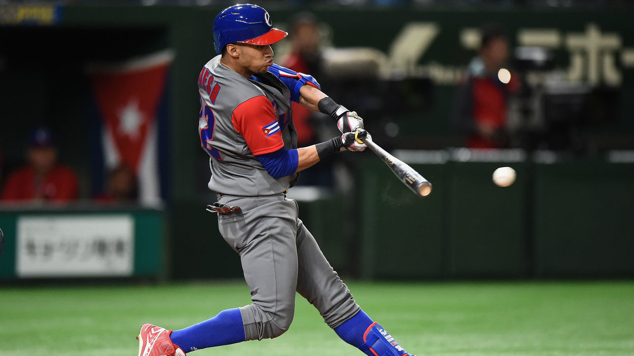 TOKYO, JAPAN - MARCH 14: Outfielder Victor Mesa #32 of Cuba hits a two run single to make it 4-2 in the top of the fourth inning during the World Baseball Classic Pool E Game Four between Cuba and Japan at the Tokyo Dome on March 14, 2017 in Tokyo, Japan.