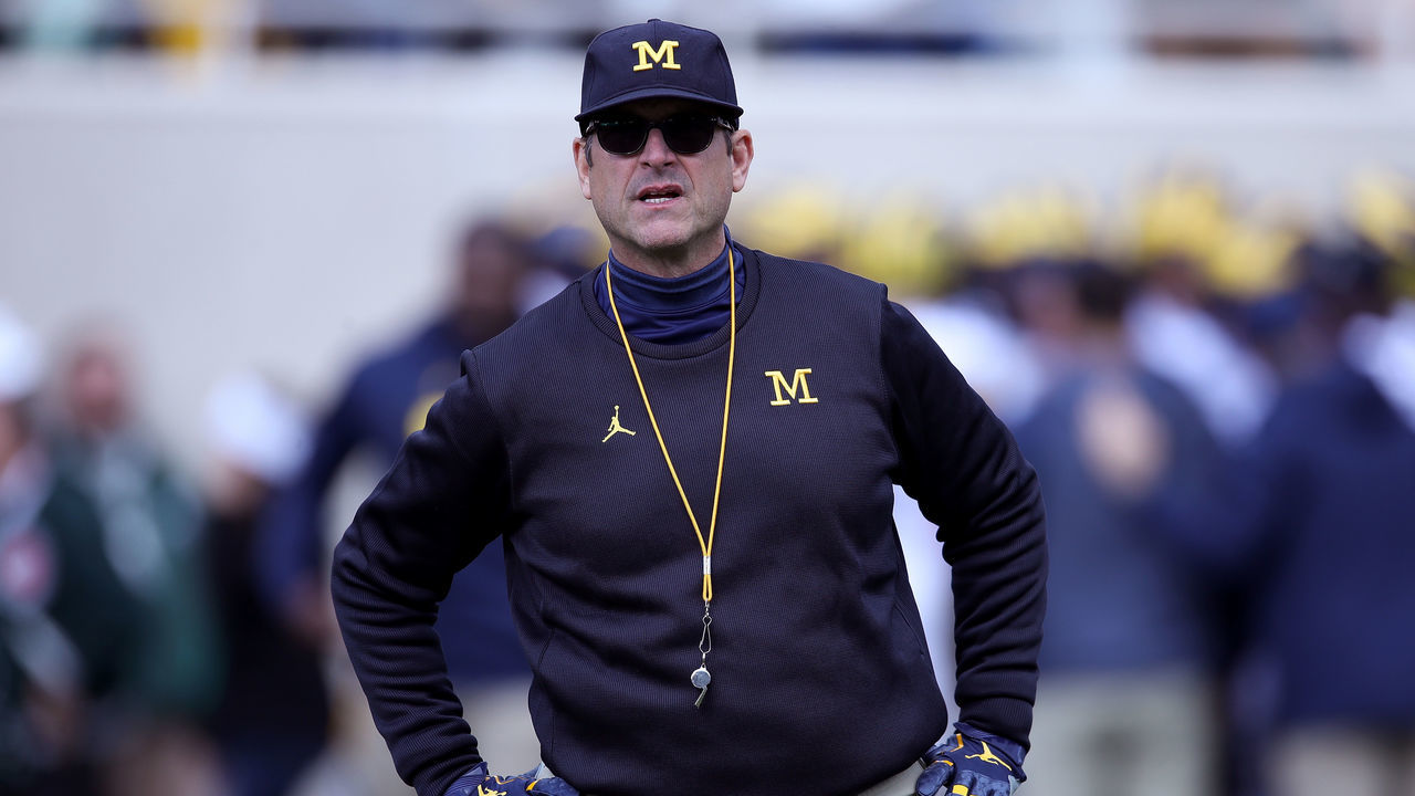 EAST LANSING, MI - OCTOBER 20: Head coach Jim Harbaugh of the Michigan Wolverines looks on during warmups prior to playing the Michigan State Spartans at Spartan Stadium on October 20, 2018 in East Lansing, Michigan.
