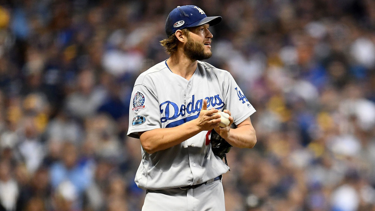 MILWAUKEE, WI - OCTOBER 12: Clayton Kershaw #22 of the Los Angeles Dodgers looks on against the Milwaukee Brewers during the third inning in Game One of the National League Championship Series at Miller Park on October 12, 2018 in Milwaukee, Wisconsin.