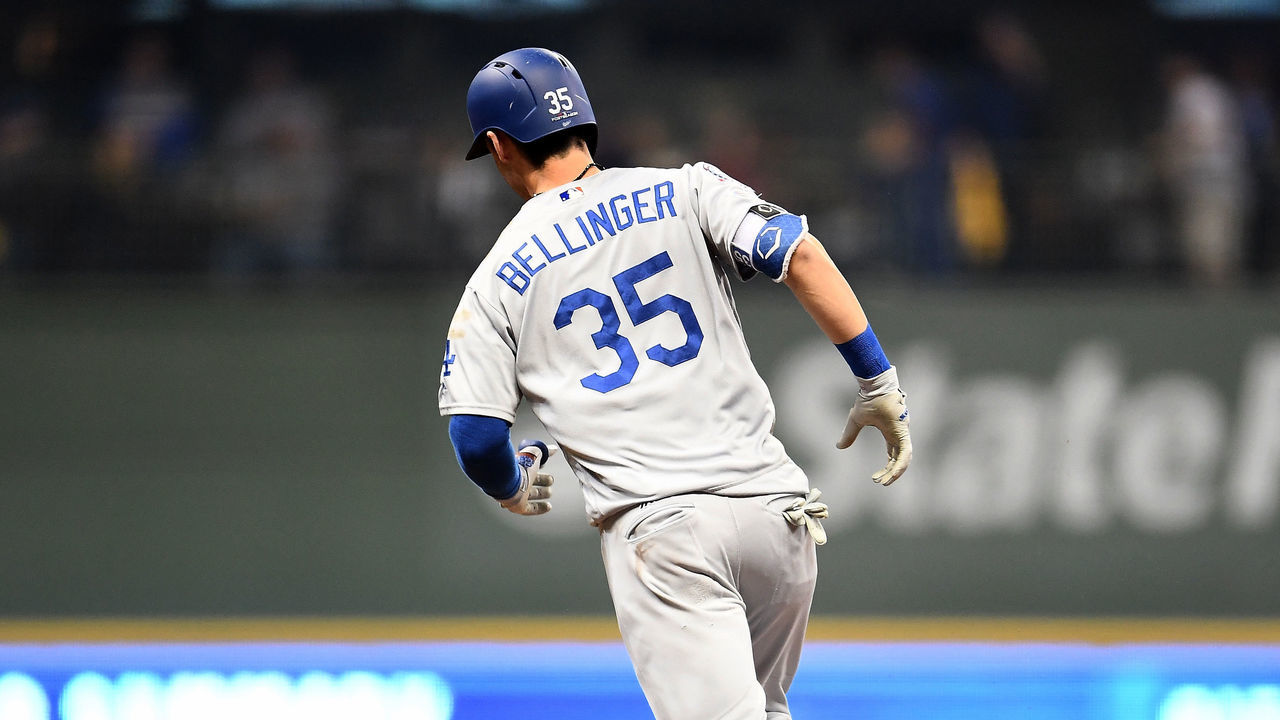MILWAUKEE, WI - OCTOBER 20: Cody Bellinger #35 of the Los Angeles Dodgers celebrates after hitting a two run home run against Jhoulys Chacin #45 of the Milwaukee Brewers during the second inning in Game Seven of the National League Championship Series at Miller Park on October 20, 2018 in Milwaukee, Wisconsin.