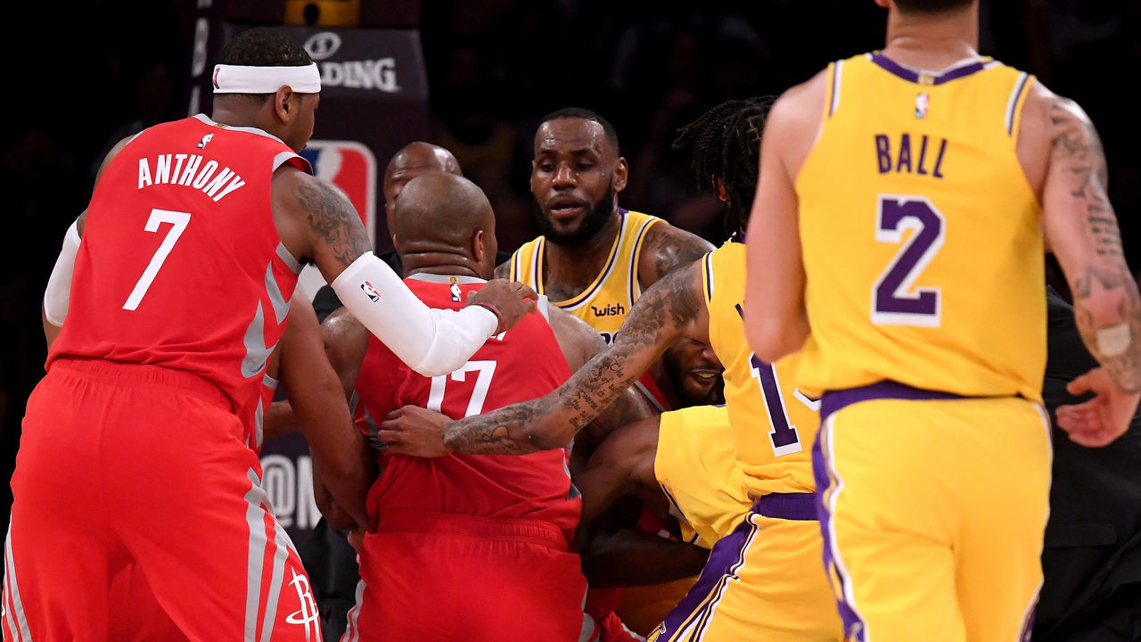 LOS ANGELES, CA - OCTOBER 20: Chris Paul #3 of the Houston Rockets and Rajon Rondo #9 of the Los Angeles Lakers fight during a 124-115 Rockets win at Staples Center on October 20, 2018 in Los Angeles, California.